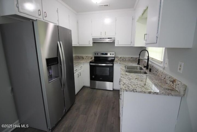 121 Walter Dr, Battleboro, NC 27809 - kitchen with stainless steel appliances, under cabinet range hood, dark wood-style flooring, white cabinets, and ornamental molding