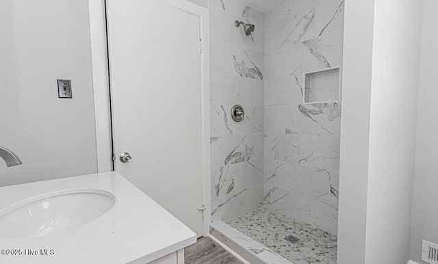 309 Mcgwigan St, Enfield, NC 27823 - bathroom featuring a stall shower and vanity