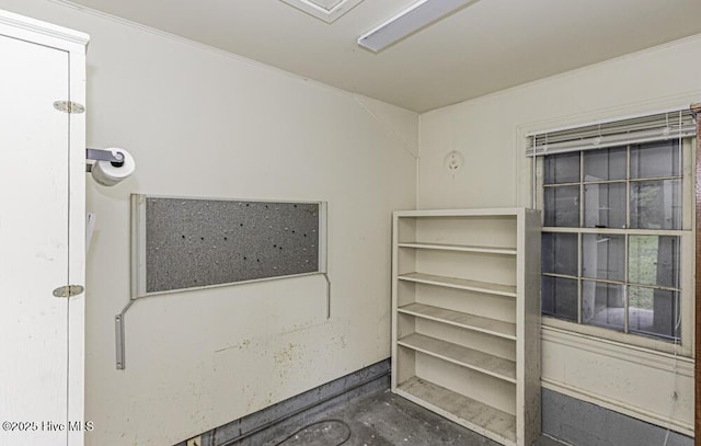 309 Mcgwigan St, Enfield, NC 27823 - spare room featuring unfinished concrete floors