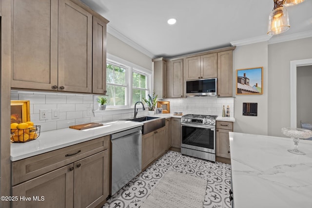 902 College St, Vanceboro, NC 28586 - kitchen featuring appliances with stainless steel finishes, crown molding, backsplash, hanging light fixtures, and recessed lighting