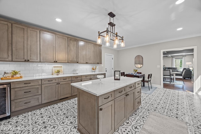 902 College St, Vanceboro, NC 28586 - kitchen with wine cooler, decorative backsplash, pendant lighting, crown molding, and recessed lighting