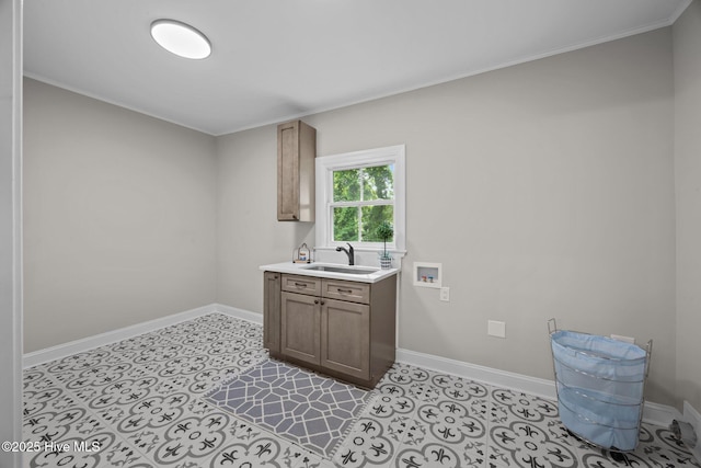 902 College St, Vanceboro, NC 28586 - laundry area with hookup for a washing machine, cabinet space, and ornamental molding