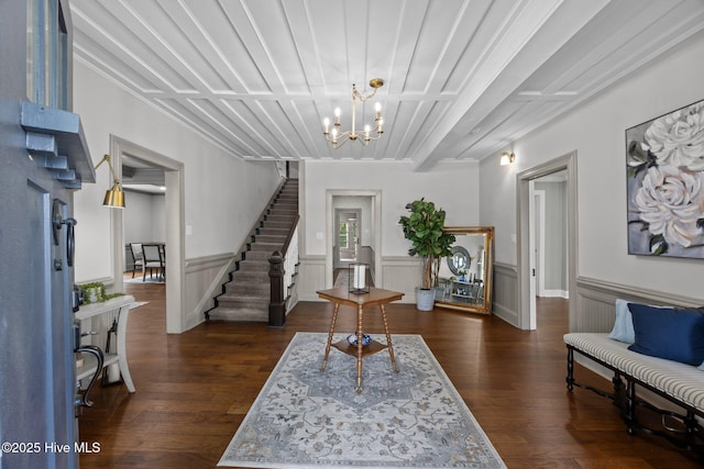 902 College St, Vanceboro, NC 28586 - entryway with a chandelier, dark wood-style flooring, stairway, and wainscoting
