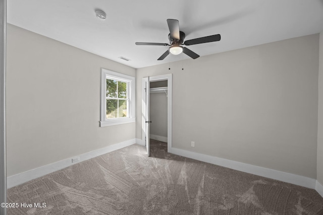 902 College St, Vanceboro, NC 28586 - unfurnished bedroom with carpet flooring, a closet, and ceiling fan