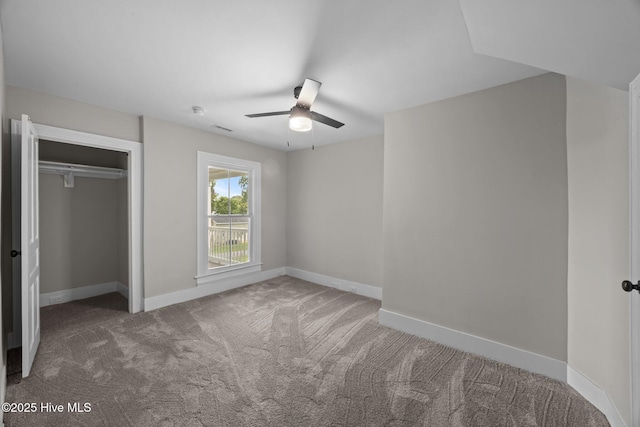 902 College St, Vanceboro, NC 28586 - unfurnished bedroom featuring carpet, a closet, and a ceiling fan