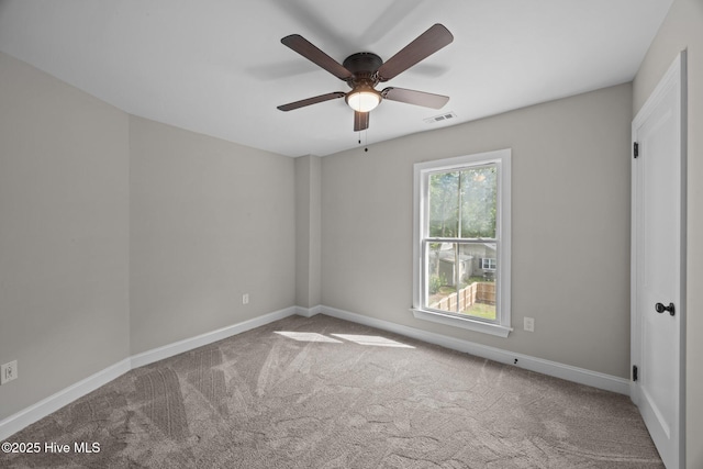 902 College St, Vanceboro, NC 28586 - carpeted spare room featuring a ceiling fan and baseboards