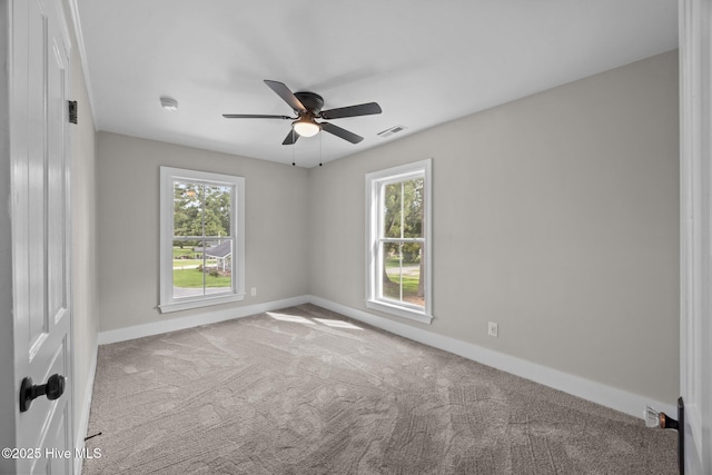 902 College St, Vanceboro, NC 28586 - carpeted empty room featuring a ceiling fan and baseboards