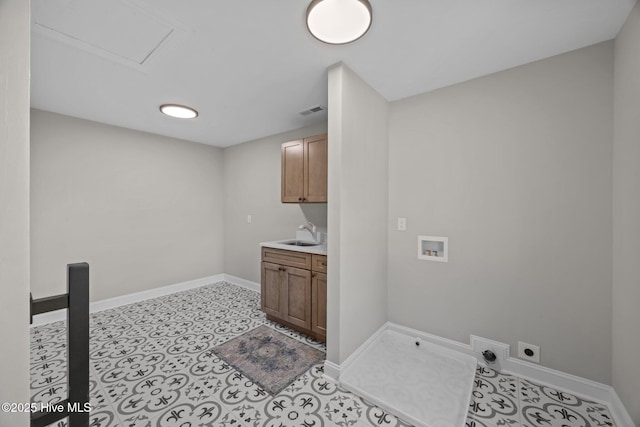 902 College St, Vanceboro, NC 28586 - laundry room with electric dryer hookup, hookup for a washing machine, cabinet space, and light tile patterned flooring