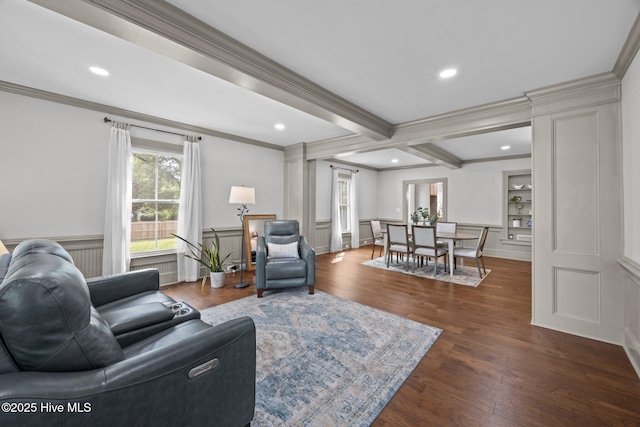902 College St, Vanceboro, NC 28586 - living area with crown molding, a decorative wall, beam ceiling, wood finished floors, and recessed lighting