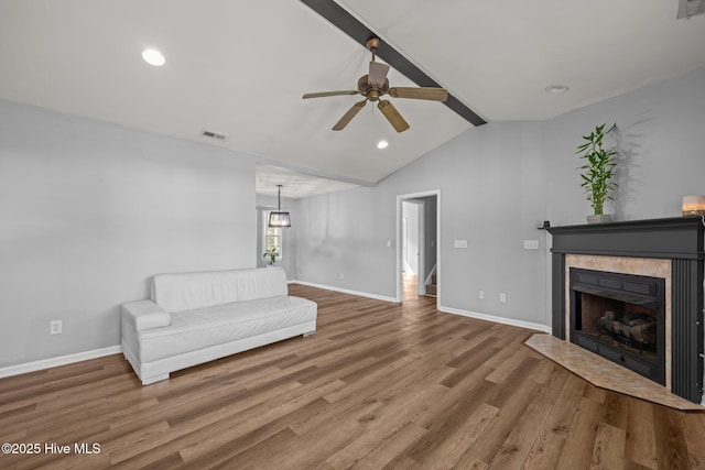 1134 Tebo Rd, New Bern, NC 28562 - unfurnished living room featuring ceiling fan, wood finished floors, a fireplace with flush hearth, and recessed lighting