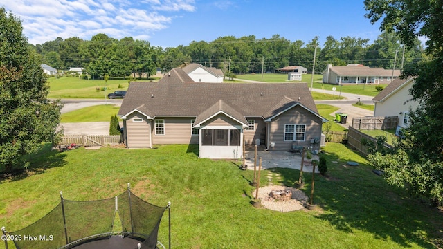 1134 Tebo Rd, New Bern, NC 28562 - rear view of house with a patio area, a fenced backyard, and a sunroom