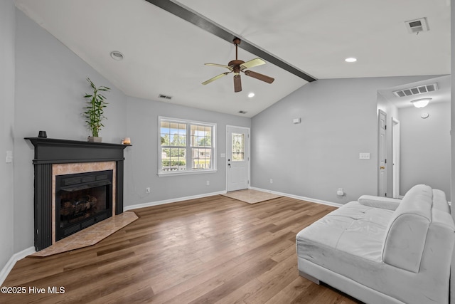 1134 Tebo Rd, New Bern, NC 28562 - living area featuring ceiling fan, wood finished floors, a tiled fireplace, and recessed lighting