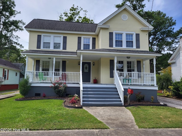 550 E Pungo St, Belhaven, NC 27810 - view of front facade with a porch, crawl space, a front lawn, and a shingled roof