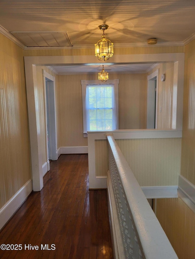 550 E Pungo St, Belhaven, NC 27810 - hall with dark wood finished floors, a chandelier, crown molding, and an upstairs landing