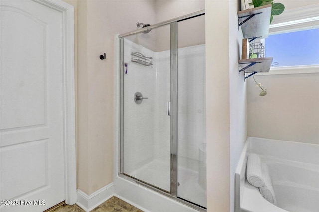 108 Bernier Ct, Princeton, NC 27569 - bathroom with a shower stall and a garden tub