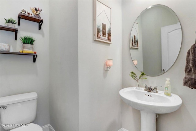 108 Bernier Ct, Princeton, NC 27569 - bathroom featuring toilet and baseboards