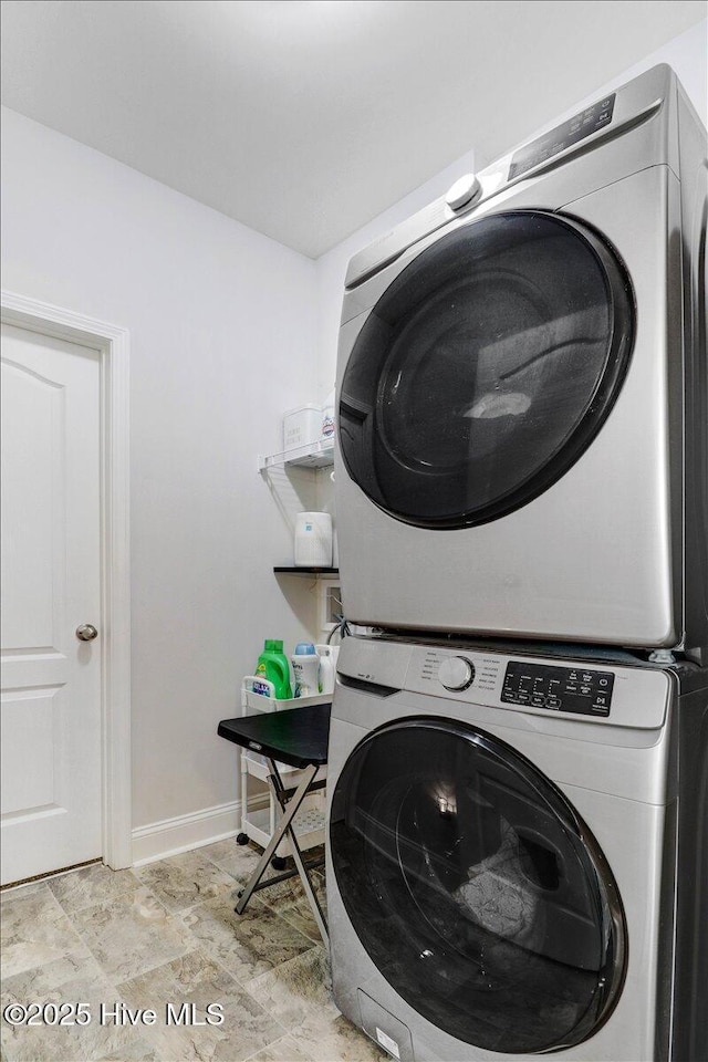 108 Bernier Ct, Princeton, NC 27569 - laundry room with stacked washer / dryer and baseboards