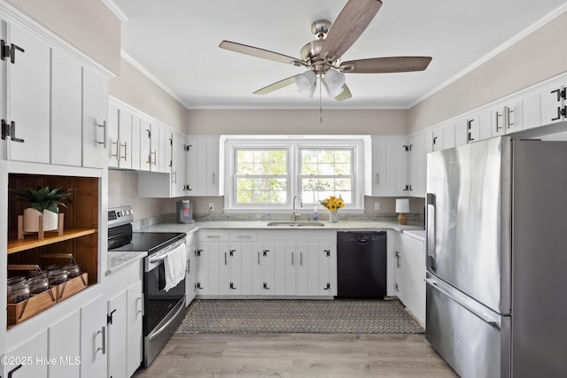 502 N 25th St, Wilmington, NC 28405 - kitchen with appliances with stainless steel finishes, a ceiling fan, light countertops, crown molding, and light wood-style floors