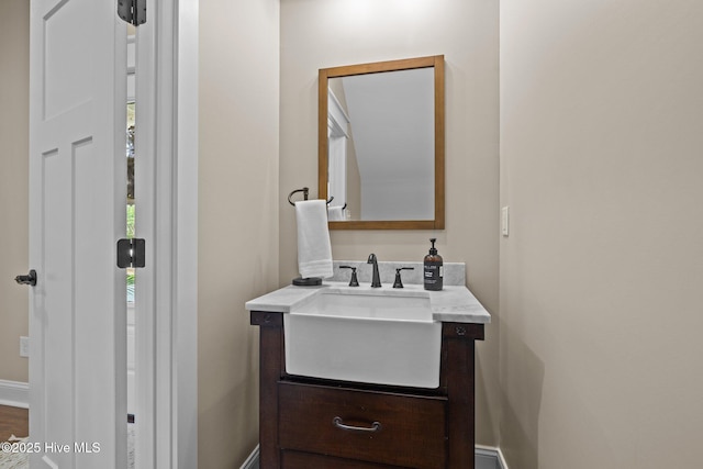 8805 Sound View Ct, Emerald Isle, NC 28594 - bathroom with vanity and baseboards