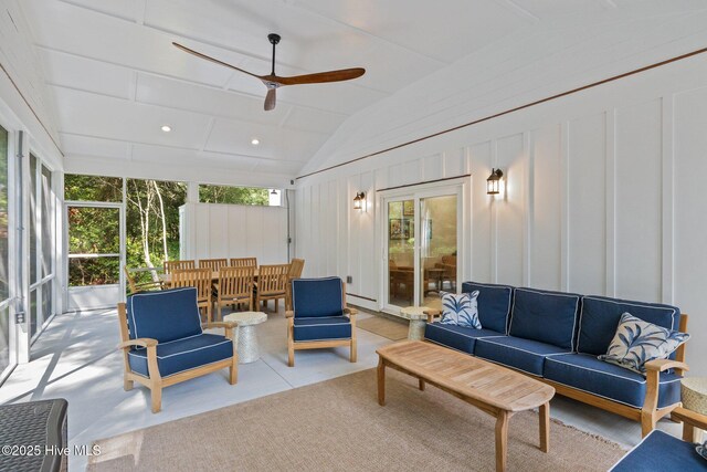 8805 Sound View Ct, Emerald Isle, NC 28594 - sunroom / solarium with outdoor lounge area, ceiling fan, a decorative wall, and lofted ceiling