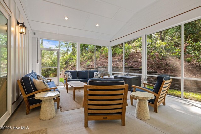 8805 Sound View Ct, Emerald Isle, NC 28594 - sunroom / solarium with an outdoor hangout area, healthy amount of natural light, and vaulted ceiling