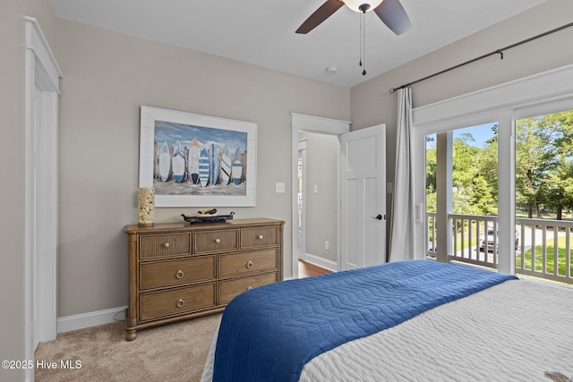8805 Sound View Ct, Emerald Isle, NC 28594 - bedroom featuring access to exterior, light carpet, and a ceiling fan