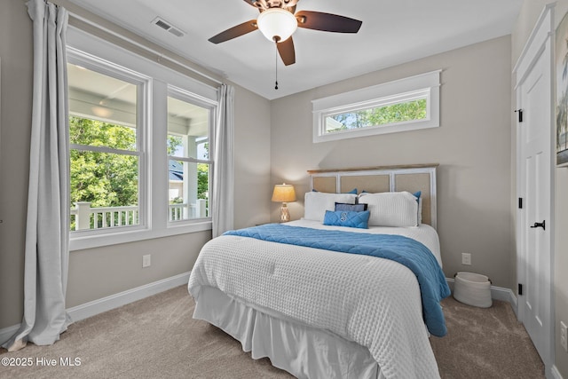 8805 Sound View Ct, Emerald Isle, NC 28594 - bedroom featuring carpet floors and a ceiling fan