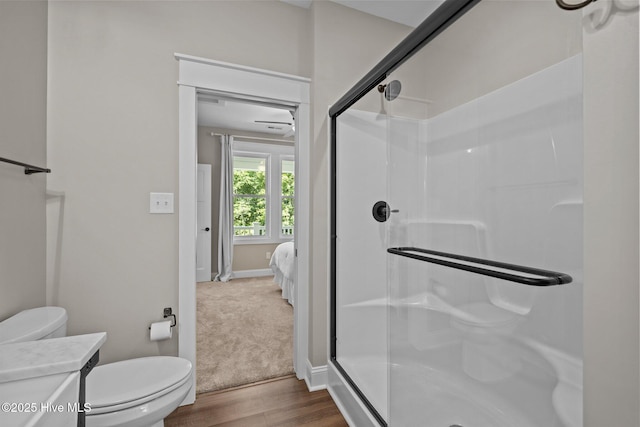 8805 Sound View Ct, Emerald Isle, NC 28594 - ensuite bathroom with a shower stall, wood finished floors, and vanity