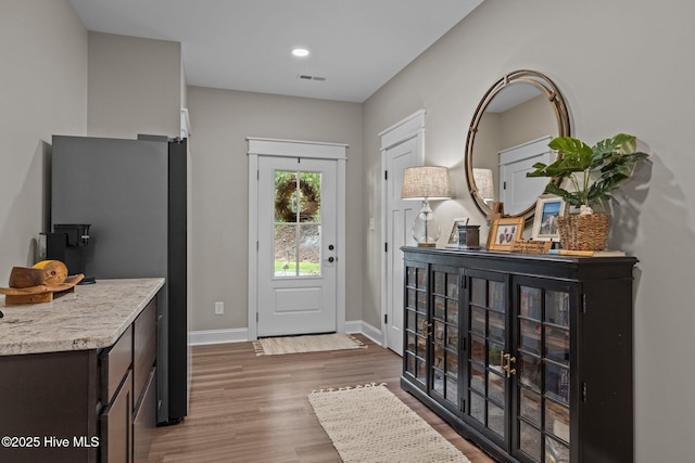 8805 Sound View Ct, Emerald Isle, NC 28594 - entrance foyer featuring wood finished floors and recessed lighting