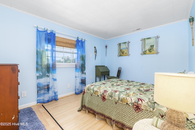 124 Holiday Knl, Hertford, NC 27944 - bedroom with wood finished floors and ornamental molding