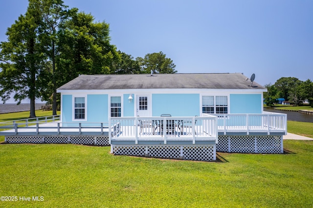 124 Holiday Knl, Hertford, NC 27944 - back of property featuring a yard, a deck, and roof with shingles