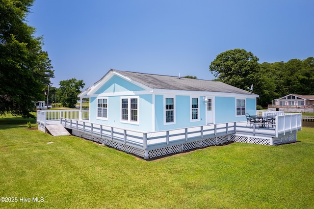 124 Holiday Knl, Hertford, NC 27944 - rear view of house featuring a yard and a deck