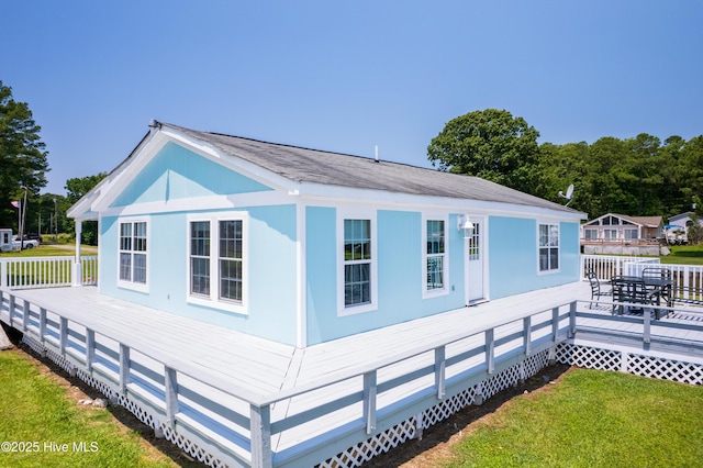 124 Holiday Knl, Hertford, NC 27944 - view of property exterior featuring a yard and a deck