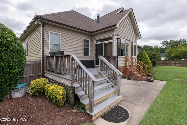 404 River Birch Dr, Greenville, NC 27858 - back of house with roof with shingles, a patio, and a deck