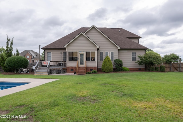 404 River Birch Dr, Greenville, NC 27858 - back of property with crawl space, roof with shingles, and a wooden deck