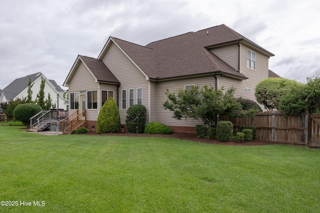 404 River Birch Dr, Greenville, NC 27858 - view of home's exterior with a shingled roof, stairs, and a deck