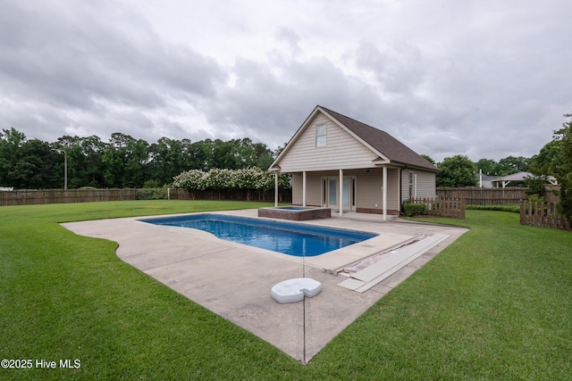 404 River Birch Dr, Greenville, NC 27858 - view of swimming pool featuring a fenced backyard, a patio, an outbuilding, and a pool with connected hot tub