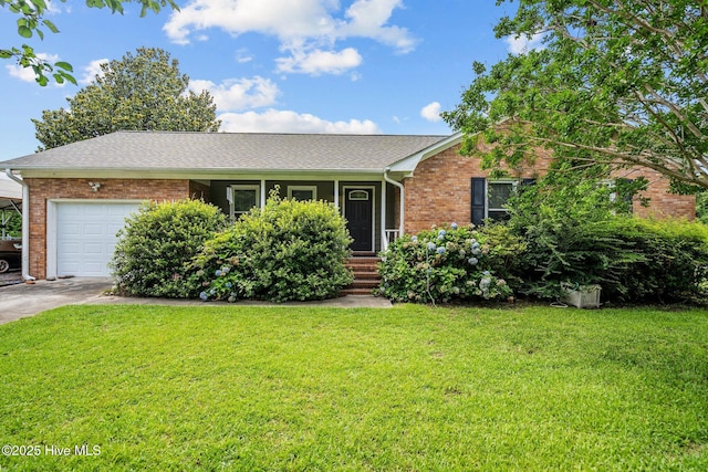 5023 Marathon Landing Ct, Castle Hayne, NC 28429 - single story home with a garage, brick siding, a front lawn, and concrete driveway