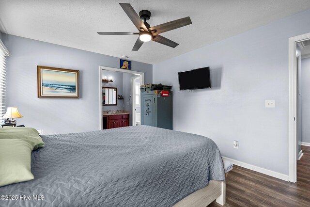 5023 Marathon Landing Ct, Castle Hayne, NC 28429 - bedroom with wood finished floors, ensuite bathroom, a ceiling fan, and a textured ceiling