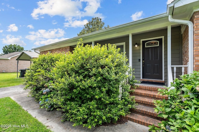 5023 Marathon Landing Ct, Castle Hayne, NC 28429 - view of exterior entry featuring brick siding