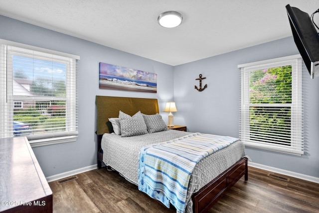 5023 Marathon Landing Ct, Castle Hayne, NC 28429 - bedroom with wood finished floors and multiple windows