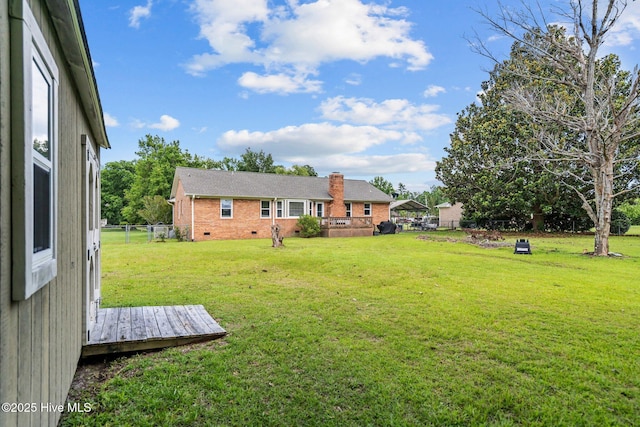 5023 Marathon Landing Ct, Castle Hayne, NC 28429 - view of yard with a wooden deck