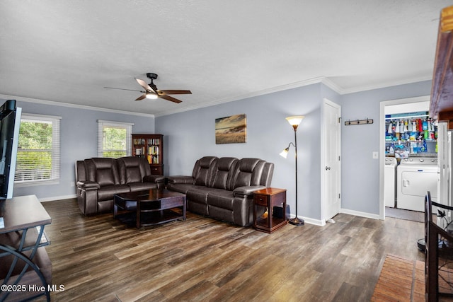 5023 Marathon Landing Ct, Castle Hayne, NC 28429 - living room featuring independent washer and dryer, ceiling fan, dark wood-style floors, and crown molding