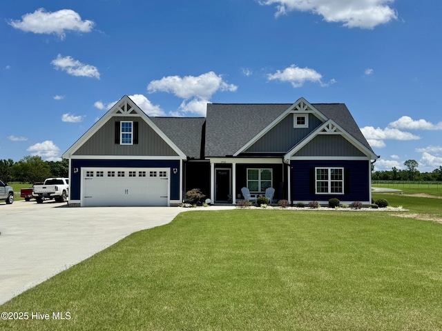 2925 Davenport Rd, Deep Run, NC 28525 - craftsman-style house featuring driveway, a front yard, roof with shingles, and a porch