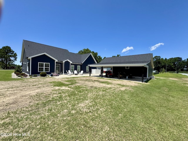 2925 Davenport Rd, Deep Run, NC 28525 - rear view of property featuring a lawn