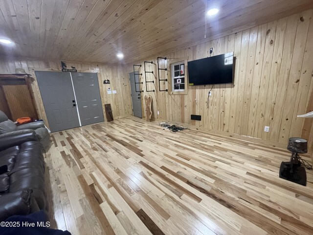 2925 Davenport Rd, Deep Run, NC 28525 - unfurnished living room with wood-type flooring, wooden ceiling, and wood walls