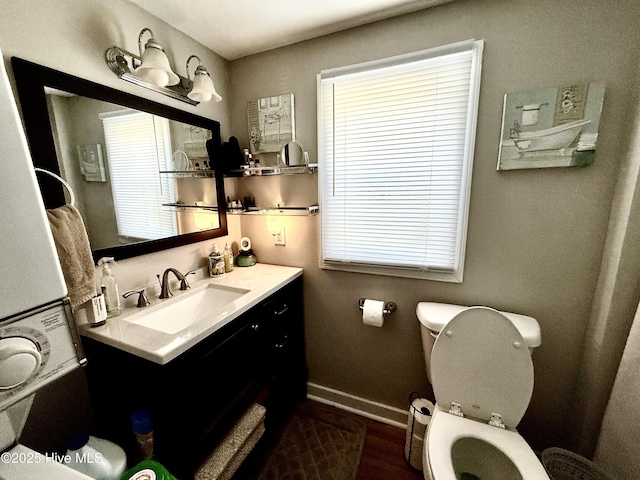 200 Carolina Beach Ave S, Carolina Beach, NC 28428 - bathroom featuring vanity, plenty of natural light, and wood finished floors
