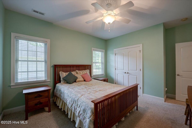 100 Knollwood Ct, New Bern, NC 28562 - carpeted bedroom featuring multiple windows, a closet, and ceiling fan
