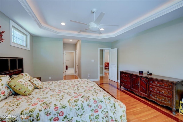 100 Knollwood Ct, New Bern, NC 28562 - bedroom featuring wood finished floors, a tray ceiling, recessed lighting, a ceiling fan, and ornamental molding