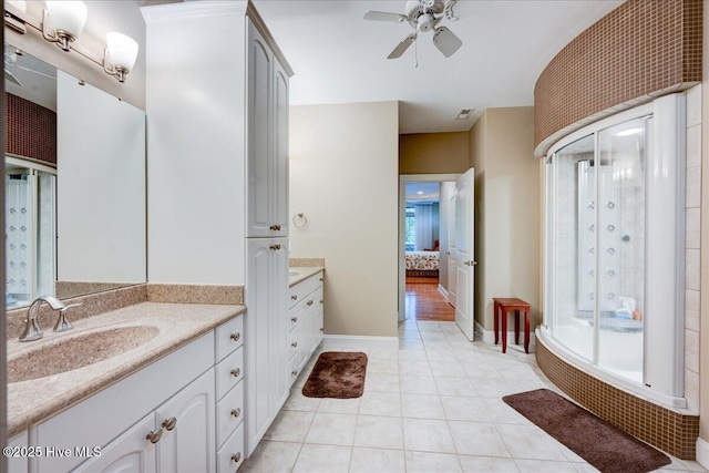 100 Knollwood Ct, New Bern, NC 28562 - ensuite bathroom with vanity, a shower stall, ceiling fan, and tile patterned floors